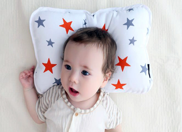 Infant shaped pillow